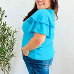 Lovely In Blue Tiered Double Ruffle Sleeve Woven Top